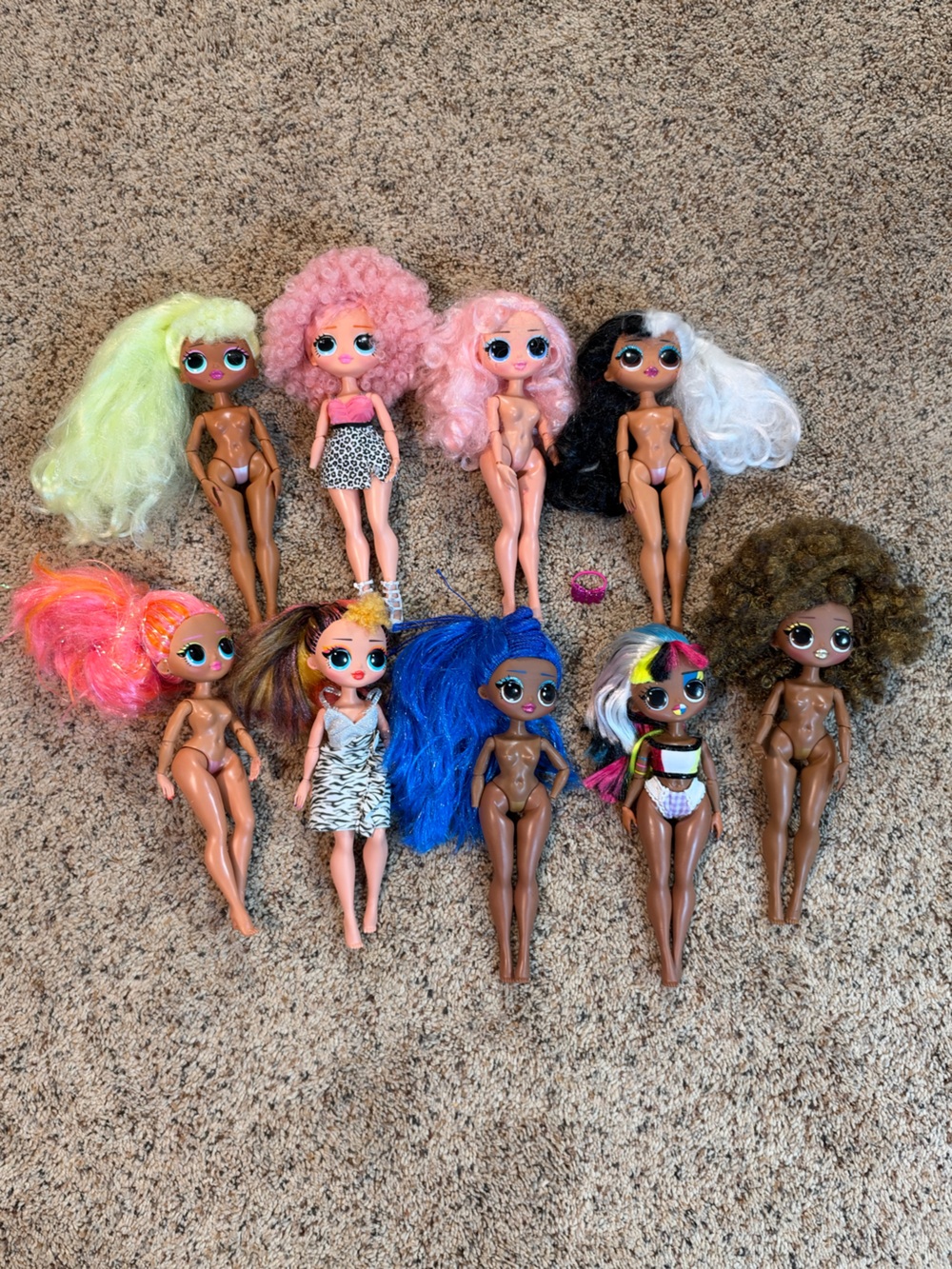 Assortment of LOL OMG Dolls